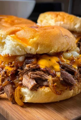 Crockpot Shredded Beef and Cheddar Sandwiches