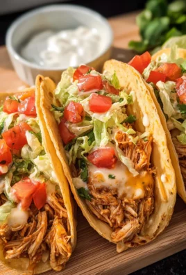 Slow Cooker Queso Chicken Tacos